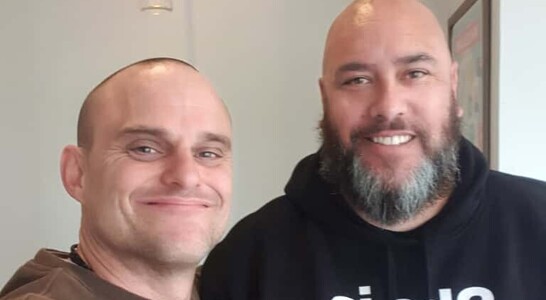 Sam Troth and supporter sharing a moment of unity and courage.