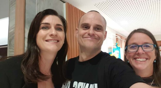 Moments of laughter and shared strength — community advocates standing together for survivors.