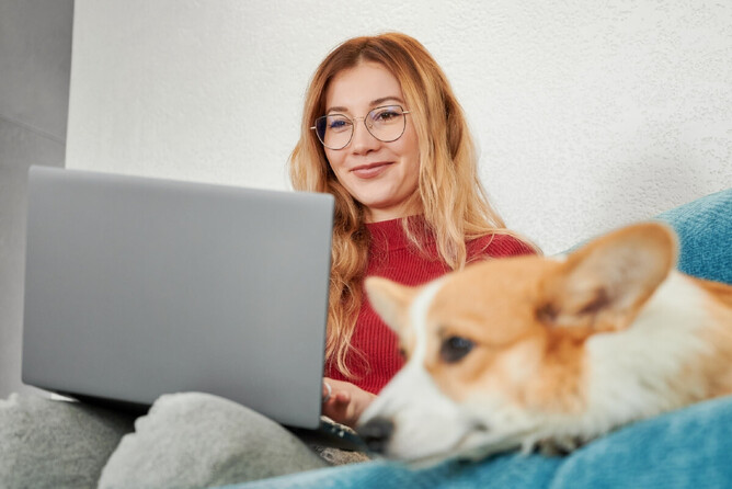 happy business owner with her dog - she has optimised her google business profile