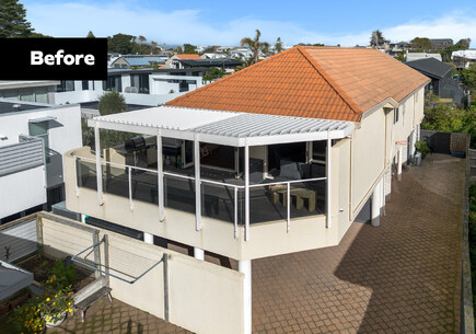Before image of a home before the builder began the demolition and renovation work.