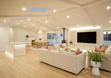 After image of the home renovation in Mount Maunganui showing the new open-plan kitchen, dining and living space.