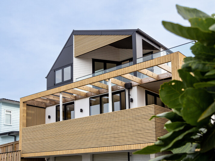The project cover image shows a full home renovation of a three-story modern home in Papamoa, completed by Straight Up Builders Tauranga.