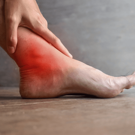Podiatrist diagnosing and managing osteochondral ankle lesion with orthotics and rehabilitation at Foot Foundation