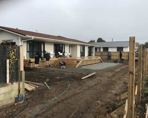 Decking is also added to the house, enhancing both its functionality and aesthetic appeal. nected and was wrapped in protective polyethylene, ready to be lifted and transported by the house moving company.