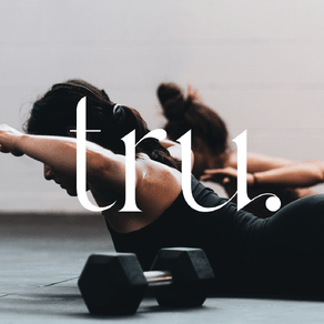 The Tru logo overlaid over an image of two women exercising.