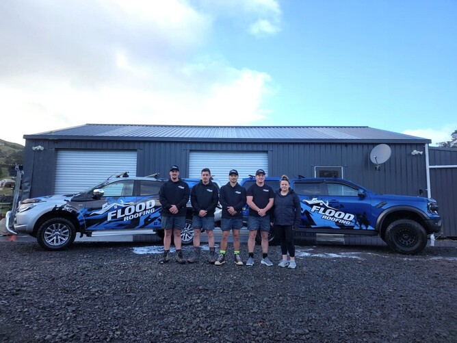 Flood Roofing team by building in Bay of Islands