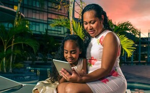 Mother and daughter using Lightspeed wifi at The Stanley Hotel Port Moresby