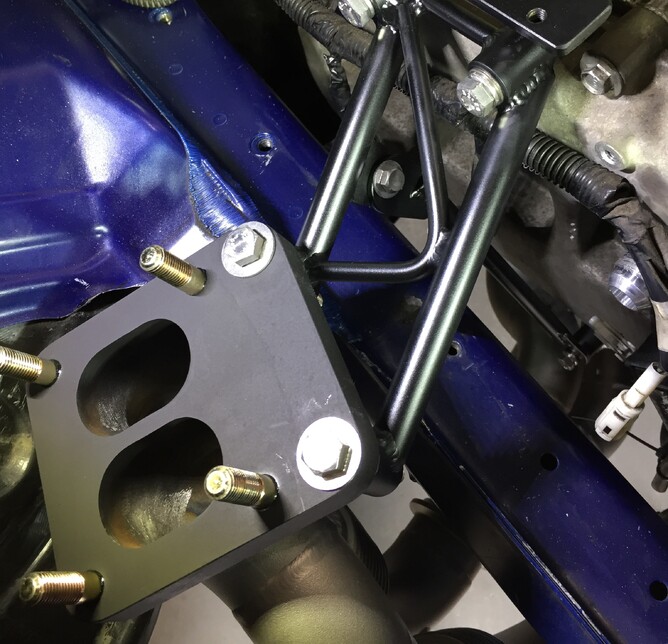 This type of bracing is solid and the turbo will not move but there are exhaust bellows in the turbo manifold to allow for thermal expansion