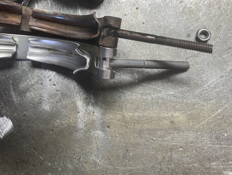 This photo shows the top clamp with the retainer cut off to allow the clamp to pull up correctly on the flange without hitting on the body of the turbo