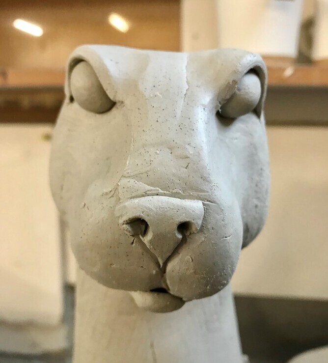 clay sculpture of a rabbit face