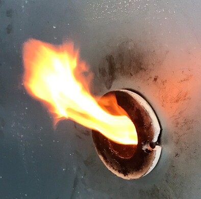 Flames emerging from the gas kiln