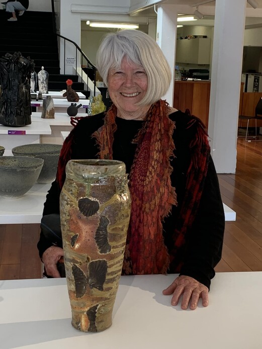 Janet Smith with her piece at UKU Clay