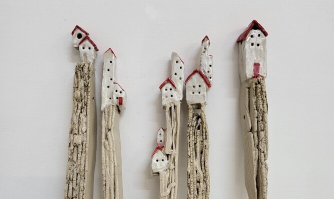 Super cute little stilt houses. We don't know who made these, but they are adorbs!