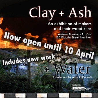 image of Clay + Ash exhibition poster. The background has flames and some clay texture. In the foreground some information about the exhibition reads: Clay + Ash+ Water. An exhibition of makers and their wood kilns. Waikato Museum - ArtsPost, 120 Victoria Street, Hamilton. No open until 10 April, Includes new work.