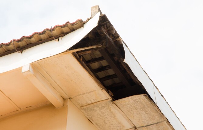 broken guttering and facia on a house