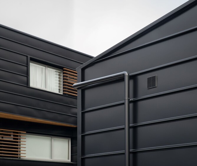 stylish black guttering and spouting by Fine Line Hamilton