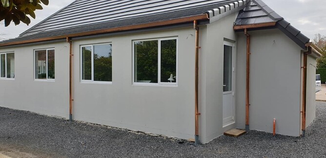 Building with copper guttering installed by Fine Line Hamilton
