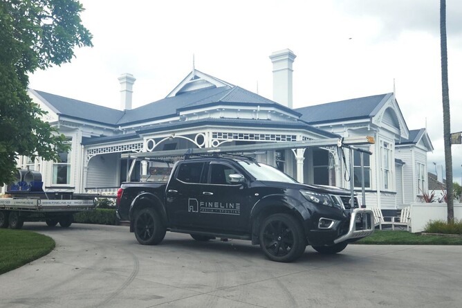 Fine Line vehicle outside house