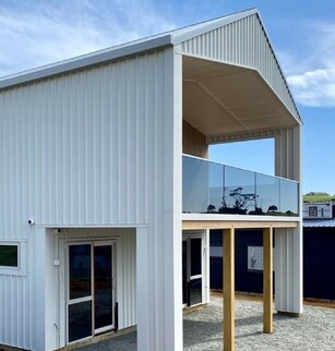 Barges installed on new home by Fine Line Fascia and Spouting