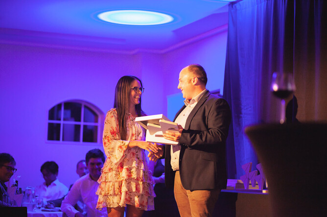 Receiving the 2021 "Best Client Impact" Rocketspark Award