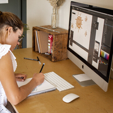 The Journal: Design processes + more. Photo at a computer, sketching and drawing