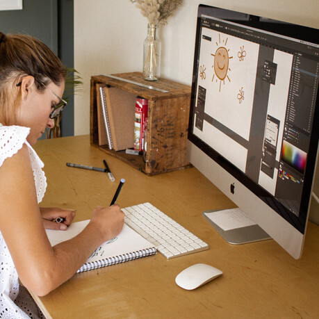 The Journal: Design processes + more. Photo at a computer, sketching and drawing