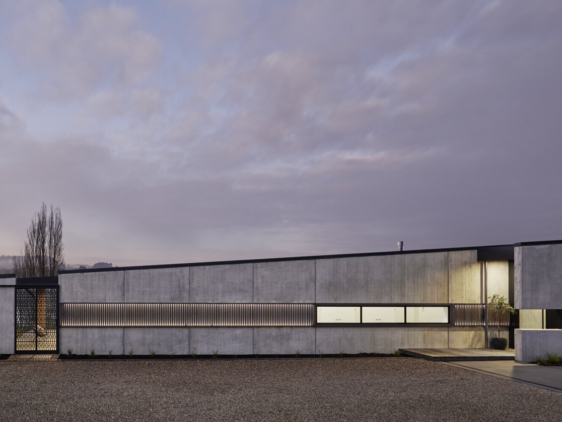award winning low profile concrete clad home modern barn house