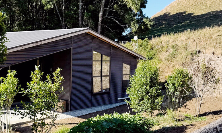 Image of office space with dark exterior cladding. Renovated by Otorohanga builders, Coull Builders.