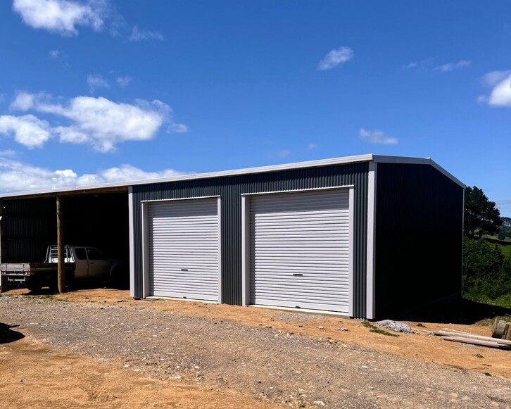 Contrasting dark & white cladded rural shed by Coull Builders, Otorohanga.