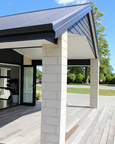 Image of outdoor alfresco area. Decking with extended covered roof . New home by Coull Builders, Otorohanga.