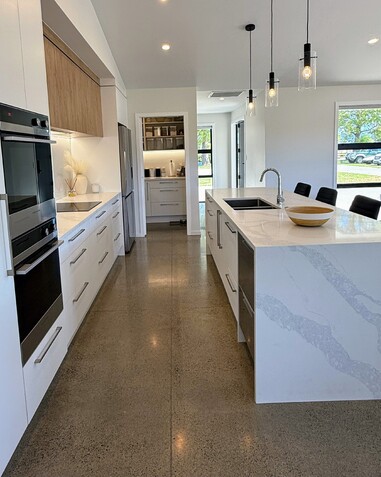 Image of newImage of light modern kitchen with timber accents. Building by Otorohanga builders, Coull Builders.