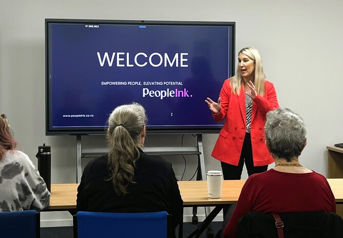 Katie Lander From PeopleInk Addresses Attendees of Sales Workshop