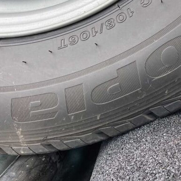 Brake tester, wheel shown on brake tester