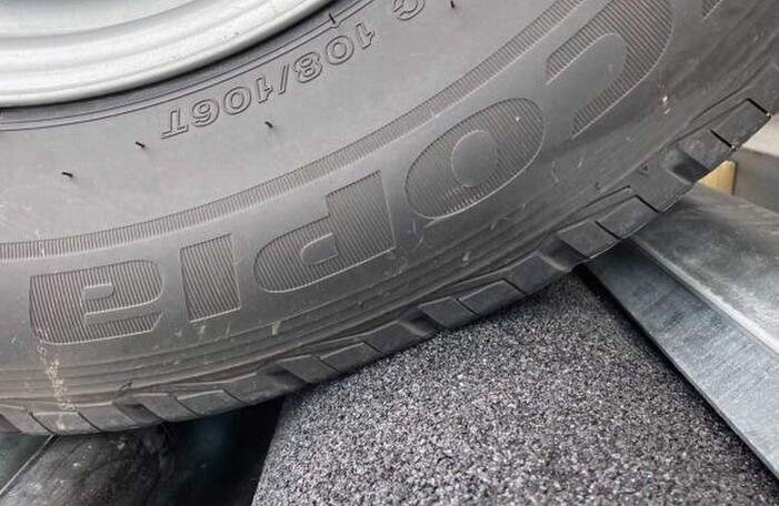 Brake tester, wheel shown on brake tester