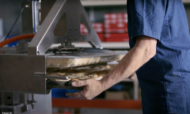 Phil Pollett of Pieline Systems using his commercial pie maker equipment