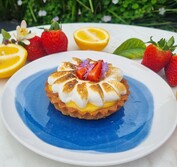 A monoportion of our Lemon tart, topped with Italian meringue and new season strawberries. 
