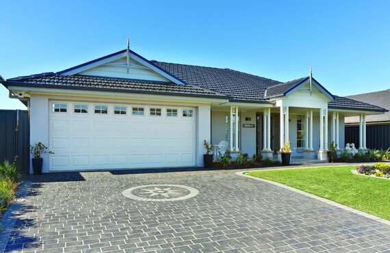 Photo of the Dominator Georgian garage door with single press window design