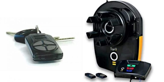 Photo of the Dominator Toro GDO-10 garage door opener with garage door remote and a wall-mounted LCD control panel to control the garage door and manage garage operating modes.