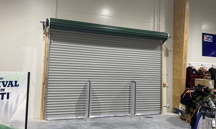 Interior photo of a shopfront garage door installed by Dominator Rodney