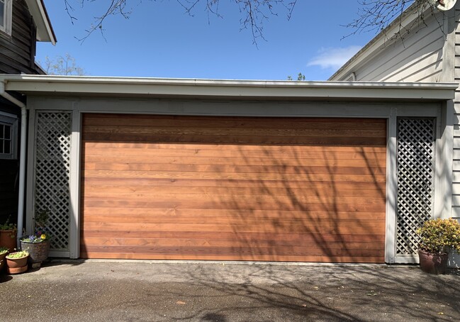 Photo of a custom timber garage door fitted to a home in Warkworth
