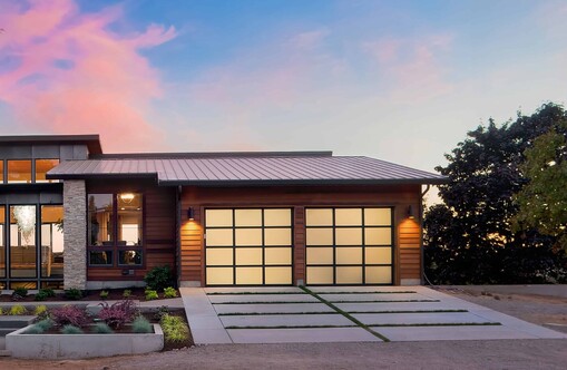 Two single garages with VL designer panels. Frosted glass and VL Designer Panels laid out in a 3 x 4 layout for each garage door