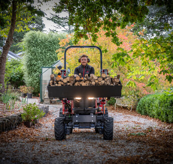 Massey Ferguson 1GC Compact Tractor moving a load