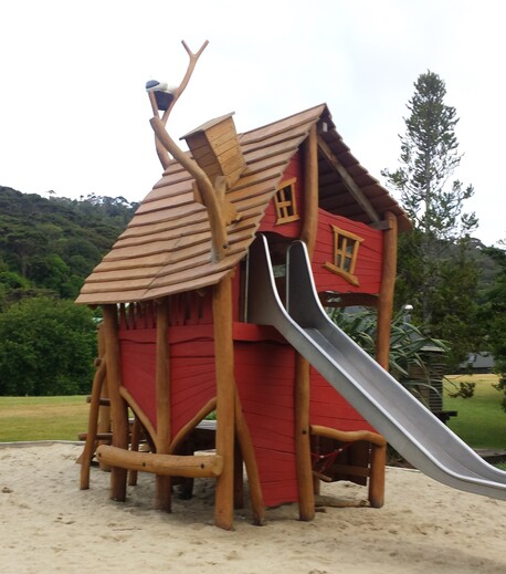 Bespoke unique red and wood treehouse