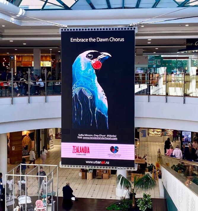 "Grey Ghost" on a digital billboard in a Wellington mall