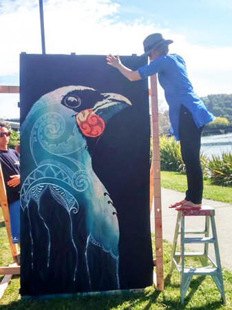 Sofia Minson with her painting "Grey Ghost" 2.4m high x 1.2m wide, acrylic on canvas