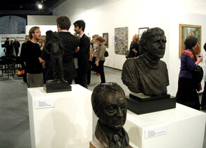 Three bronzes: from left to right, Norman Kirk, Clarence Beeby and Bruce Mason. Behind them artists Freeman White (left) and Nick Cuthell (right) talk.