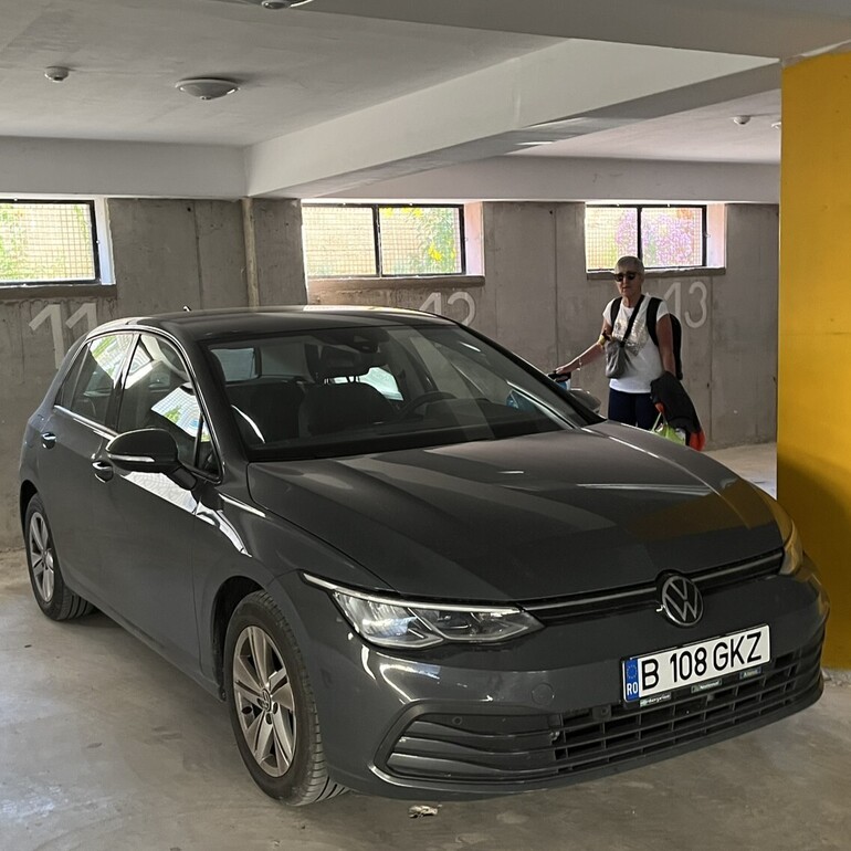 VW Golf parked in an underground carpark.