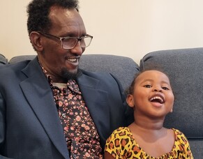 Miles of smiles for former refugee