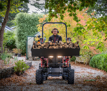 Massey Ferguson 1GC Compact Tractor  moving a load