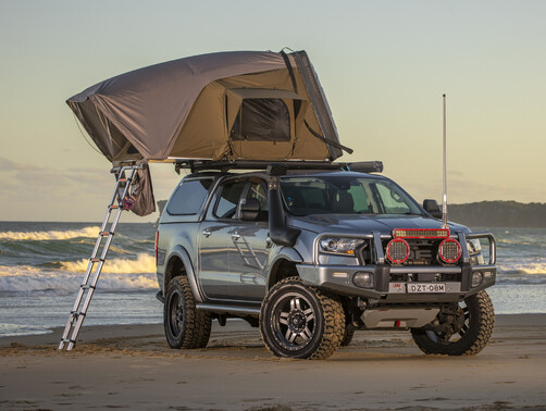 ARB esperance rooftop tent set up on a Ford Ranger on a beach